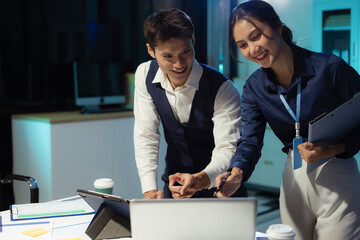 Business team analyzing financial data and planning projects in modern office.