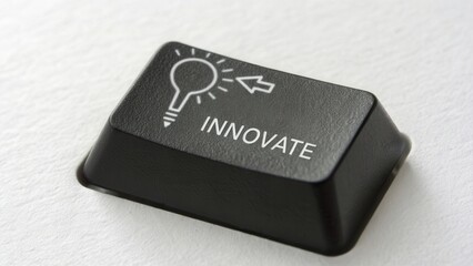 Creative Keyboard Key Featuring Light Bulb Symbol and Text Innovate for Inspiration and Idea Generation in Design