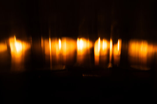 Lens Flare. Light over black background. Easy to add overlay or screen filter over photos. Abstract sun burst with digital lens flare background. Gleams rounded and hexagonal shapes.