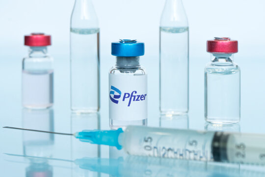 Vials of liquid the logos pfizer