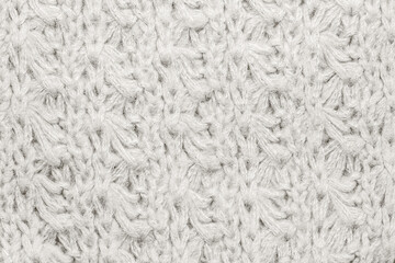 Cloud Dancer knitted fabric texture in a close-up shot, perfect for backgrounds