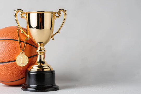 Basketball Trophy and Medal &ndash; Championship Award with Orange Ball for NBA Cup Celebrations and Sports Achievement Presentations