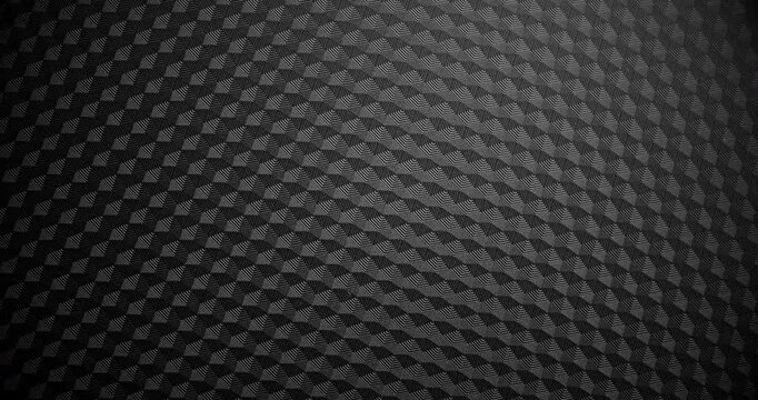 Carbon Texture Seamless Loop. Close-up of premium black carbon fiber weave with subtle light shift, creating a high-tech, endlessly background.