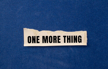 One More Thing message written on ripped torn paper background. Conceptual One More Thing symbol. Copy space.