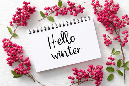 2025 calendar page with elegant serif title hello winter surrounded by pink berries on white background for seasonal decor