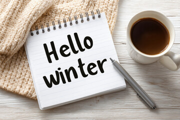 Cozy winter typography design with coffee and sweater background for seasonal inspiration