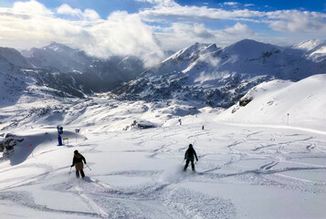 View of ski slope in Obertauern resort, Austria. Mountain winter panorama landscape in Alps.