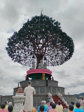 Closeup beautiful view of the Mandaragiri Hill or Basadi betta and Jain Temple with people.