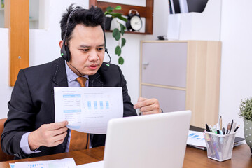 Dynamic Professional Presenting Quarterly Report During Virtual Meeting in Home Office