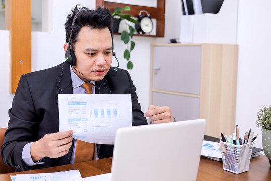 Dynamic Professional Presenting Quarterly Report During Virtual Meeting in Home Office