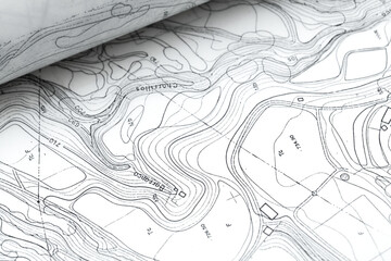 Obraz premium Very detailed Topographic maps on tracing paper rolled up into a tube 