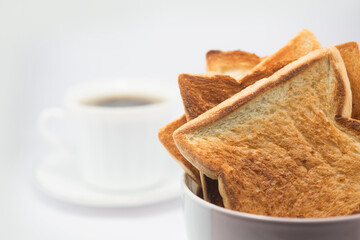 Breakfast with coffee and toast on white background
