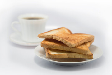 Breakfast with coffee and toast on white background