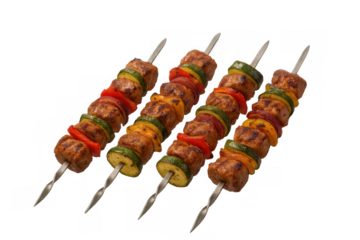 Grilled meat and vegetable skewers for a healthy barbecue meal, fresh shish kebabs on metal skewers