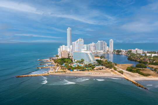Aerial drone view of Bocagrande peninsula Cartagena with beachfront hotel complex sandy shores and calm Caribbean Sea