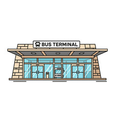 A bus terminal building with glass windows and a sign on top.