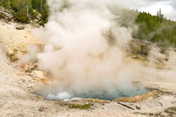 Yellowstone, Wyoming, USA - 30 May 2025: Bubbling pool of boiling water at the Beryl Spring in Yellowstone National Park. No people.