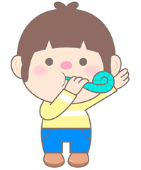 Cute little boy blowing party blower