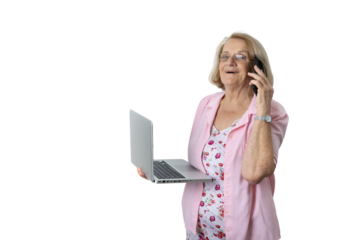 Senior woman multitasking, talking on phone and holding laptop