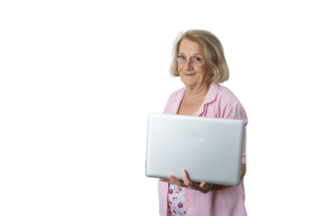 Smiling senior woman explaining digital literacy using laptop