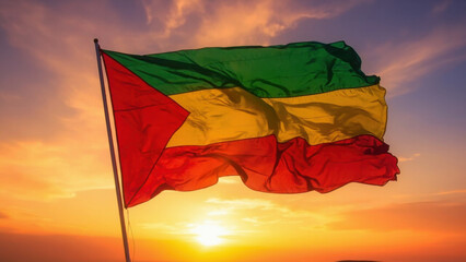 Ethiopian flag waving in the wind against a beautiful sunset sky