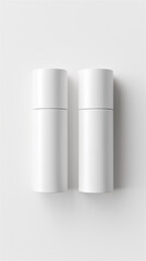 Two sleek white cosmetic containers placed on a clean surface, showcasing minimal beauty packaging and contemporary skincare design.