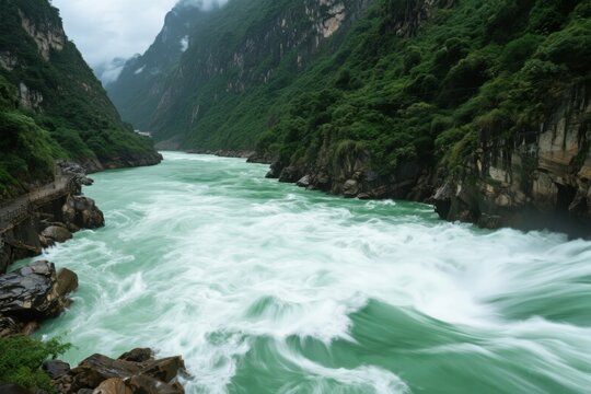 Rapid turquoise river flowing through a narrow mountain gorge with lush green vegetation and rocky cliffs - Powered by Adobe