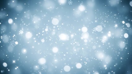 Blurred winter background with bokeh lights and snowflakes soft blue backdrop for Christmas and holi