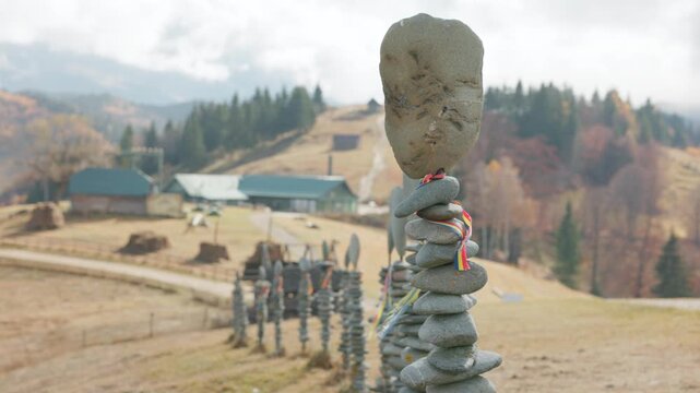 Stone Cairn At The Amfiteatrul Transilvania, Outdoor Cultural Venue And Ecological Complex In Rucăr-Bran Of Romania. Static Shot