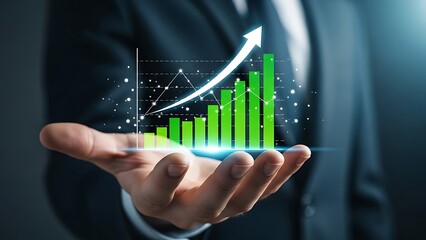 Businessman holding upward trending green bar graph with arrow