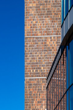 Geometry blends with reflection across an architecture facade, generating pattern and minimalism while contrast strengthens structure through clean lines and geometric design