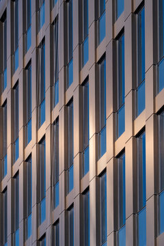 Architecture facade built on geometry, reflection and pattern as minimalism and contrast complement the structure expressed through clean lines and geometric design
