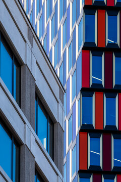 Modern architecture facade emphasizing geometry, reflection and pattern while minimalism and contrast highlight structure crafted with clean lines and geometric design