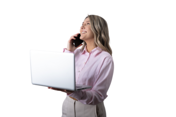 Businesswoman talking on phone while holding laptop