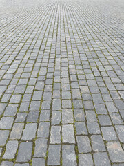 Abstract background. Old cobblestone pavement closeup