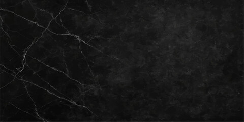 Dark grunge black paper texture with a rough vintage surface and textured gray wallpaper backdrop