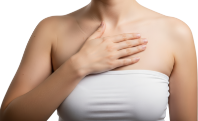 Woman's chest and shoulder with hand resting on chest area plain white bandeau top isolate Skin Body