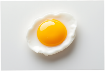 Perfectly cooked fried egg with bright yellow yolk on white background