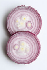 Fresh red onions sliced into rings overhead shot