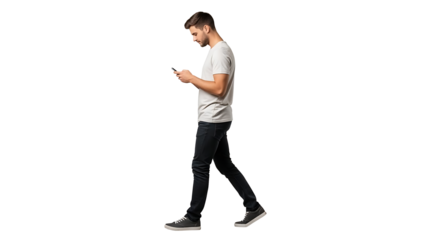Young man walking while looking down at his mobile phone isolated on transparent background