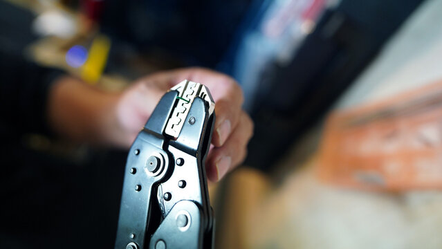 Terminal crimping tool securing wire connector for safe electrical connection