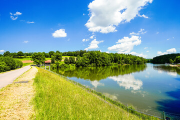 View of Lake Kre&szlig;bach and the surrounding landscape. Nature by the lake near Ellwangen.
