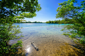View of the Langwieder lake district and the surrounding landscape. Nature by the lake near Munich...