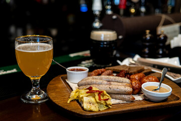 Two Beers with German Sausage Appetizer