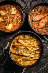 Portuguese traditional food fish soup  and seafood risotto meal on restaurant table in lisbon
