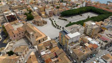 Fototapeta premium Aerial view of the Santuario di Santa Lucia al Sepolcro, in Syracuse, Sicily, Italy. It's a Catholic church built on the site where Saint Lucy was martyred. It's located in the square of the same name