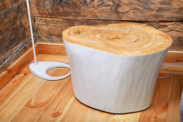 Wooden stump displays rings and natural texture for use in interior design.