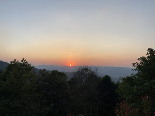 Obraz premium Sunrise Over the Mountain Ridges