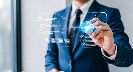 Close-up of a man in a suit using a virtual screen to check off tasks, symbolizing digital workflow, planning, and successful execution of duties.