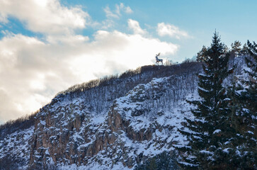 snow covered forest and rocks in Jermuk valley (Vayots Dzor, Armenia)